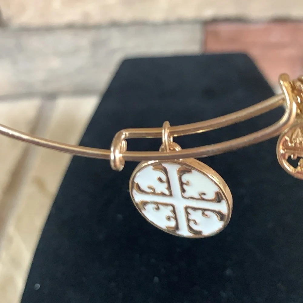 Tory Burch red/gold and white/gold with three gold charms bracelet